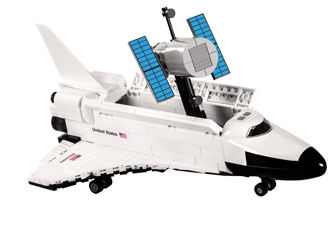 Space Shuttle holding Satelite